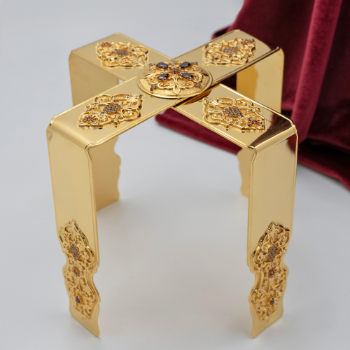 2.7.1054лп Звездица латунная с красными камнями в позолоте